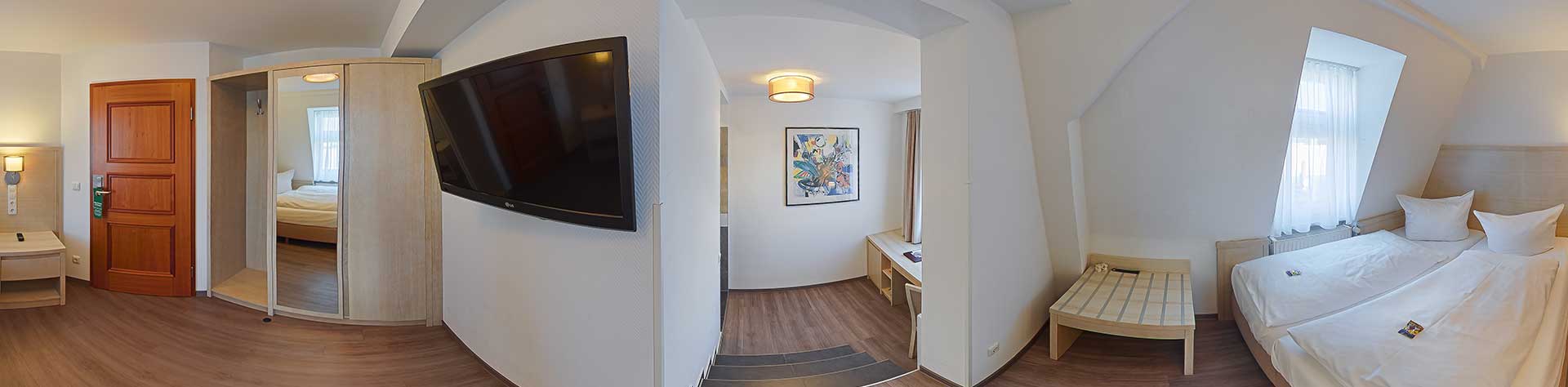 Einzelzimmer im Hotel Fürsteneck Bernburg – gemütliches Bett und modernes Design